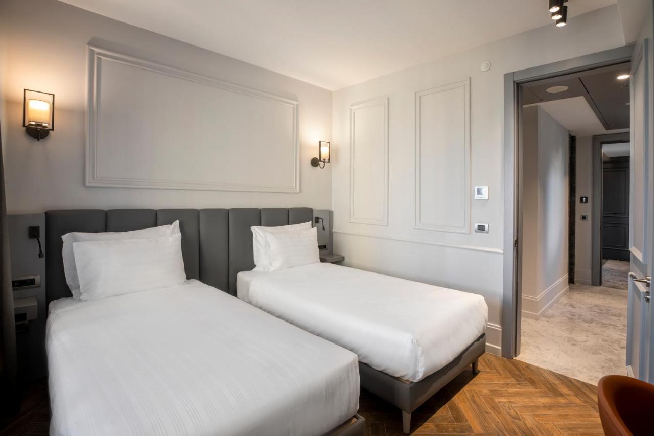 Wish More Hotel Sisli Istanboel Buitenkant foto A room at the hotel